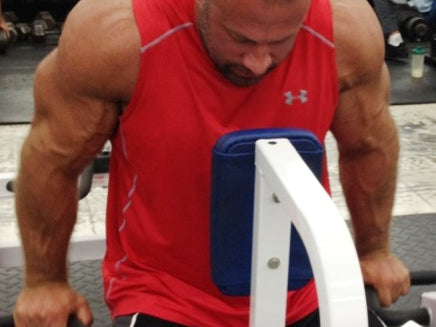 Arms, beads, booze and torn bis