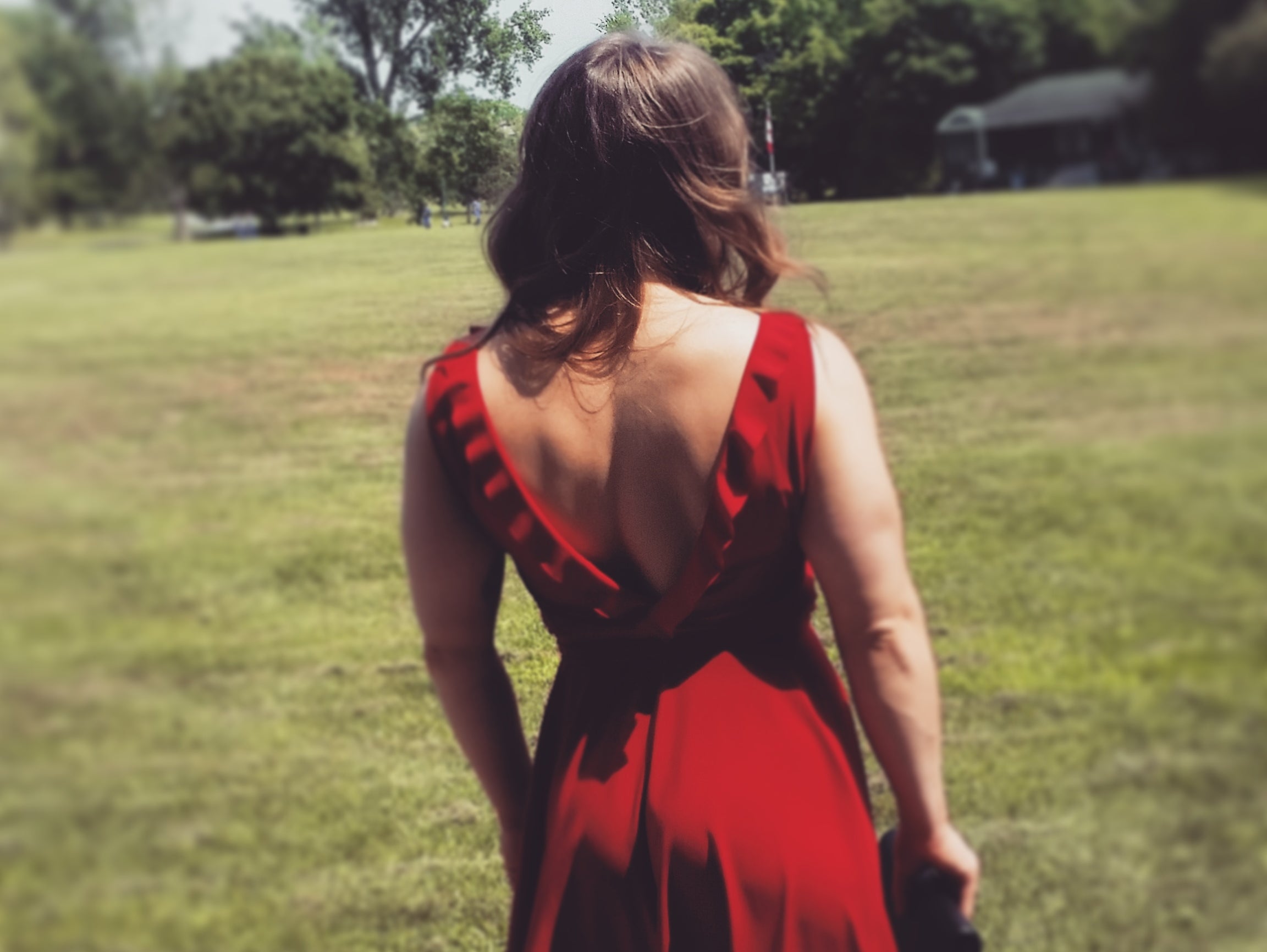 A powerlifter in a red dress