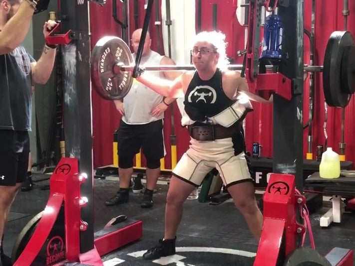 Suit Squats in a Roomy Fleshbag, Shirted Benches, and Many Gym Visitors