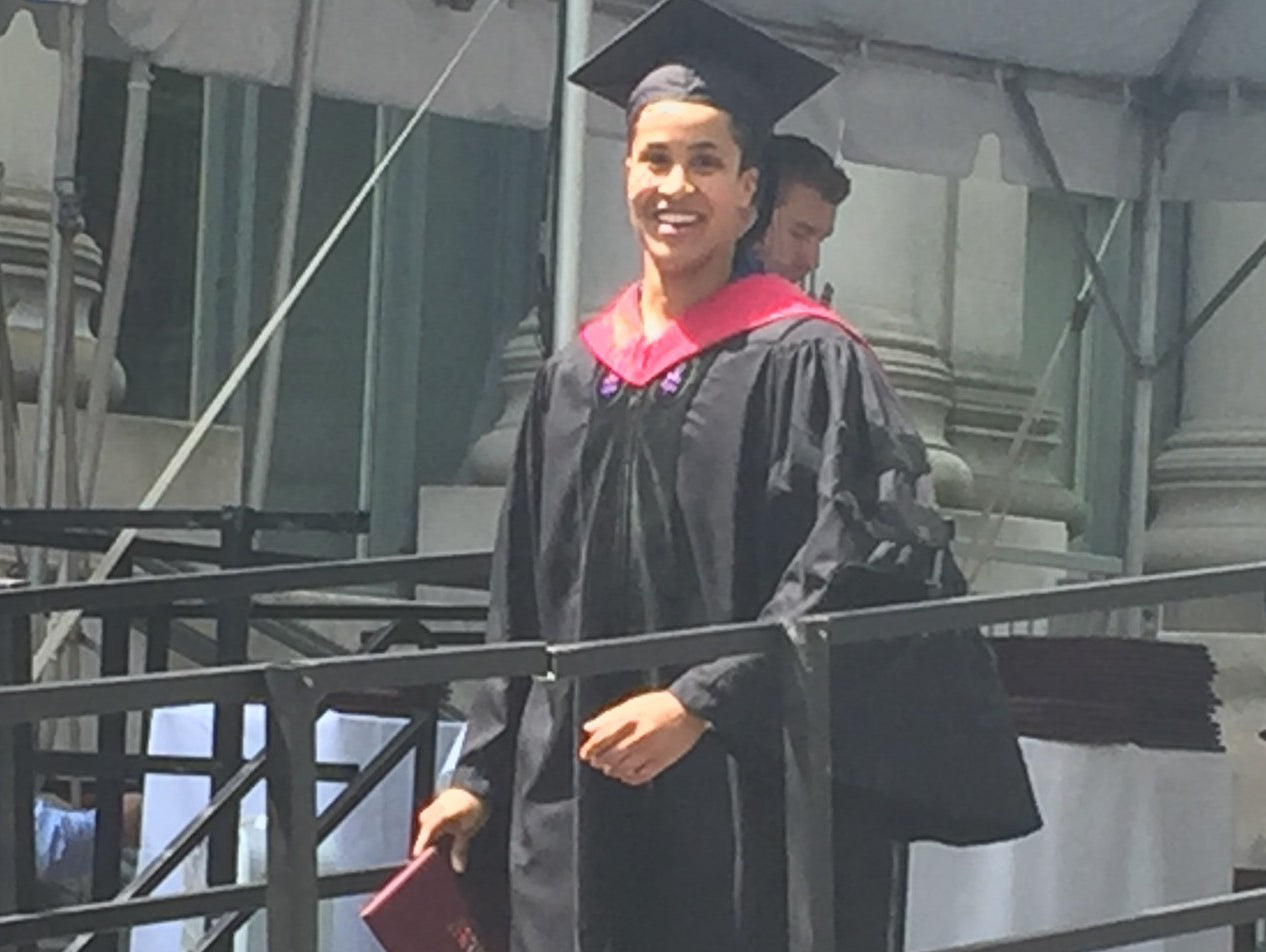 Graduating from Harvard Law....