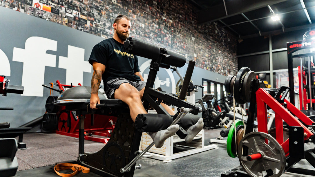 Leg extension leg curl machine