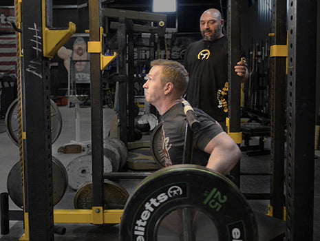 WATCH: How to Box Squat with the Rackable Cambered Squat Bar