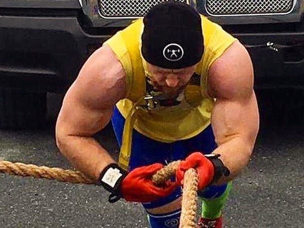 Tugging a Semi & Lifting Balls (w/ video)