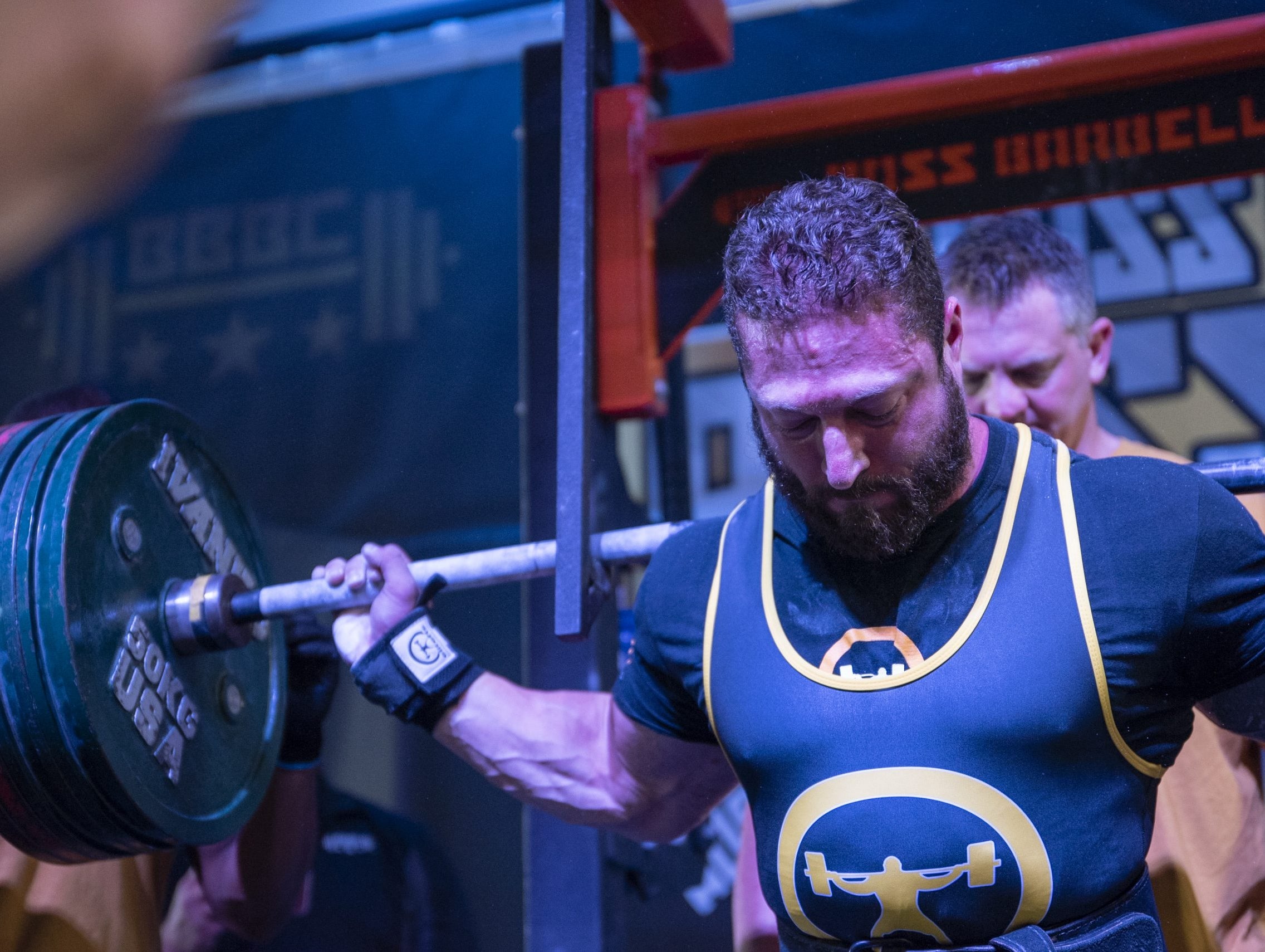 Client Coaching: Use this drill to cue 'tight lats' in the squat