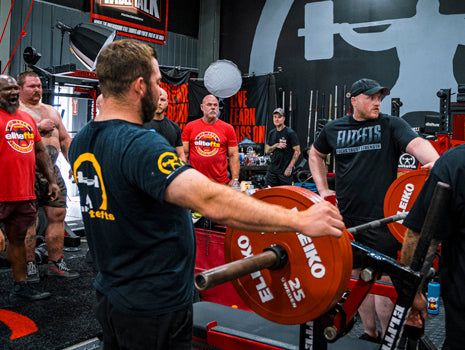 guys benching in gym
