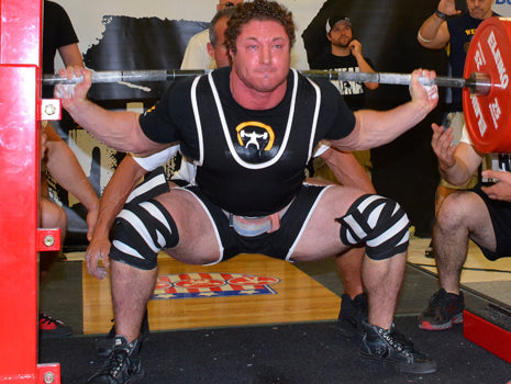 Squats against chains