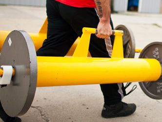 Working on Quicker Feet with Loaded Carries (Video)