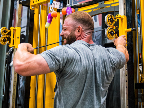 real delt work by a guy using a cable machine