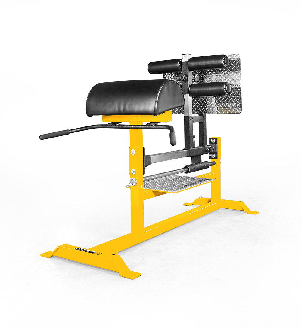 Yellow gym machine with black padding on a white background