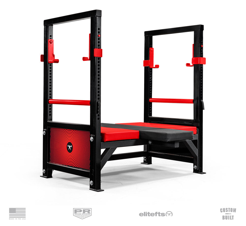 Black and red weightlifting cage with bench on a white background