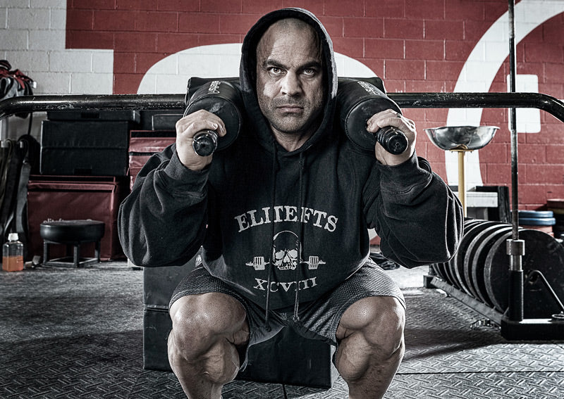 lifter squatting with SS YOKE BAR on back