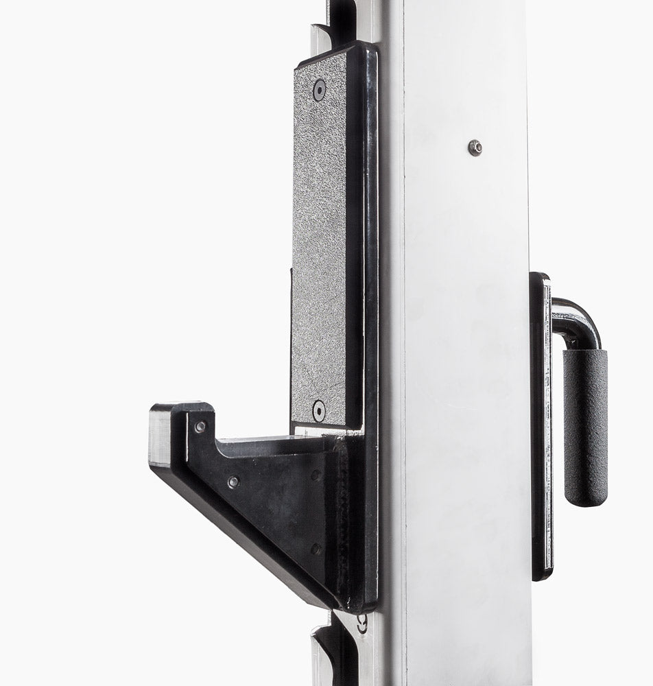 Close-up of a door handle and lock mechanism on a white door.