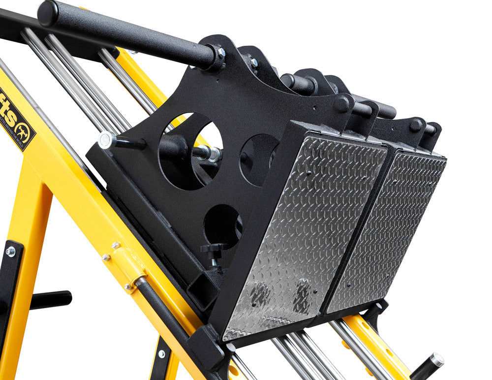 Close-up of a yellow and black piece of equipment with visible branding on a white background