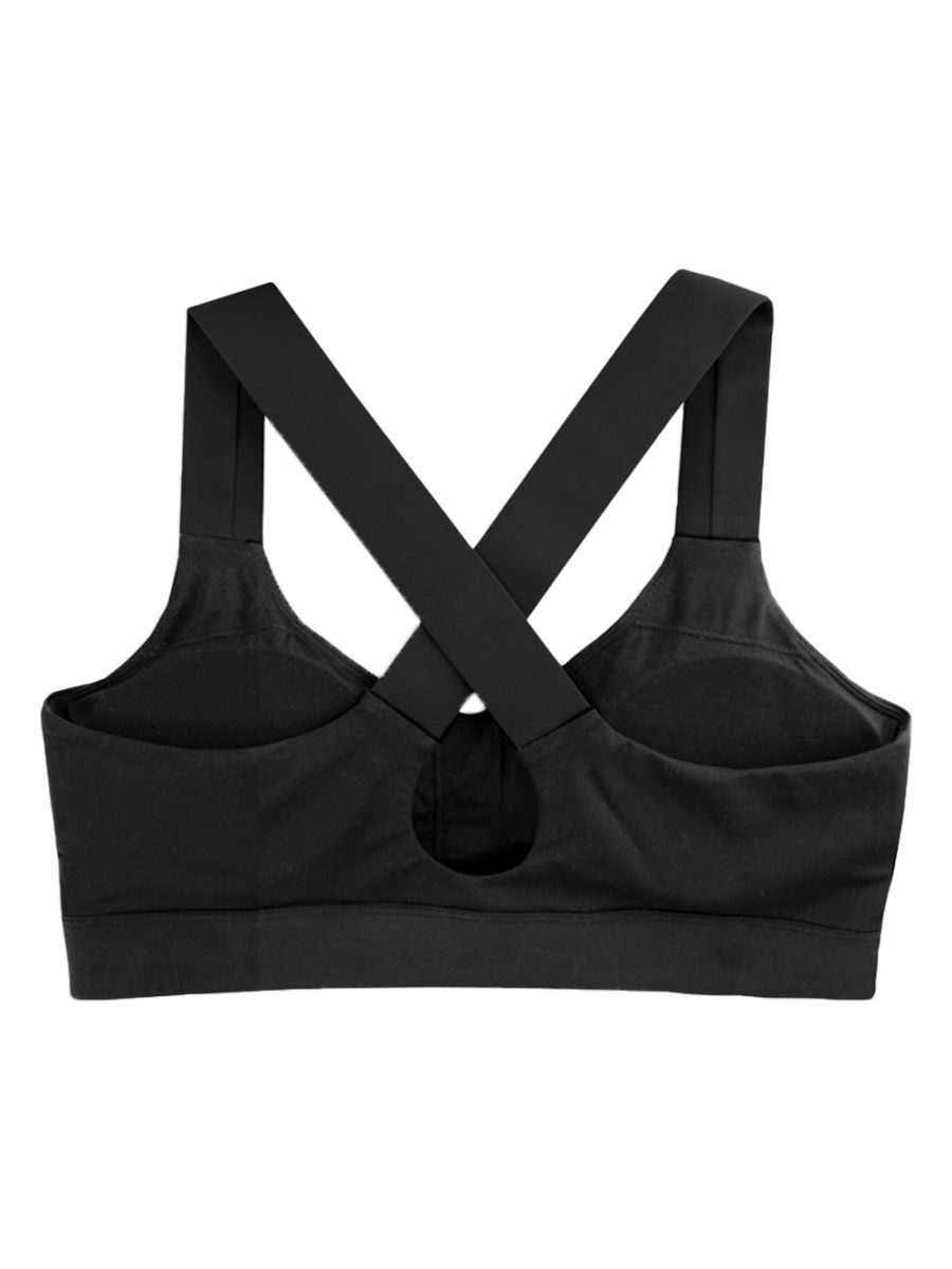 Black sports bra with criss-cross straps on a white background