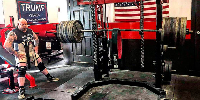 guy staring at loaded bar