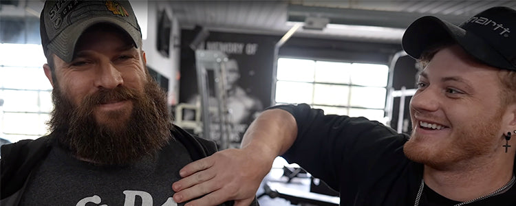 Bret and darryl smiling and showing camaraderie