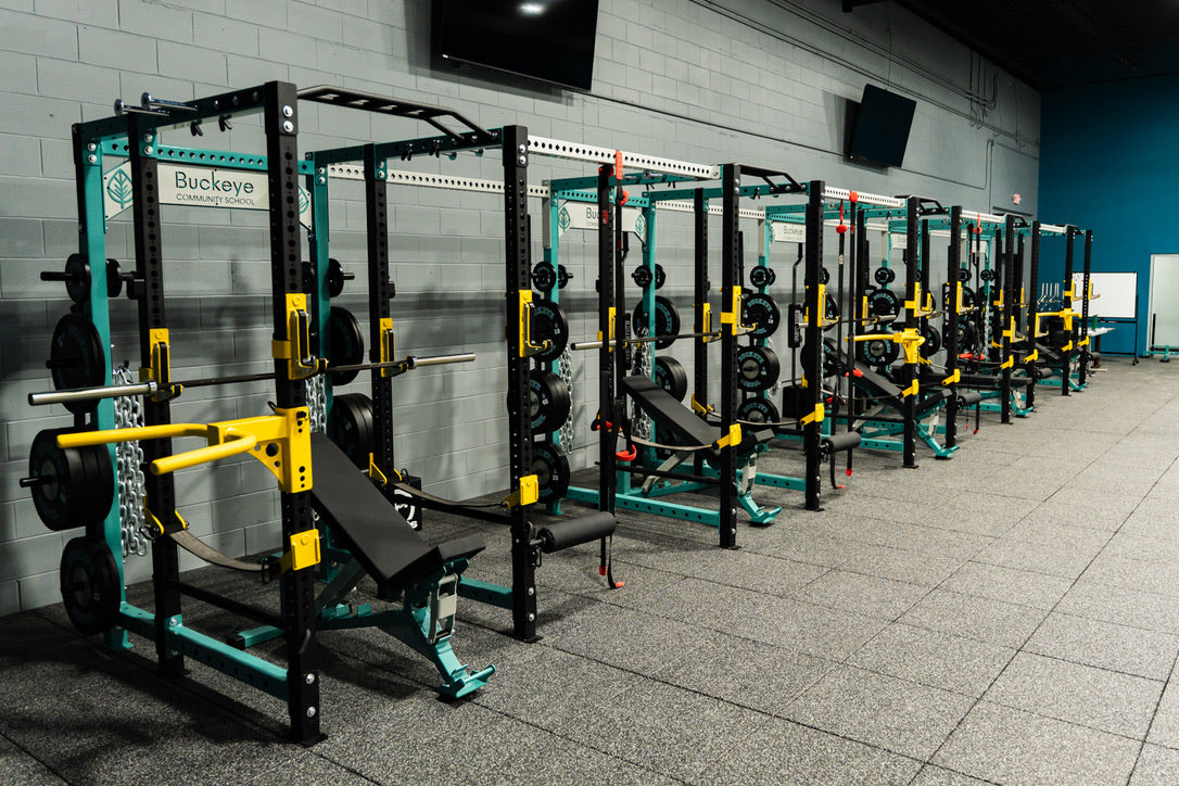 Buckeye Community School custom elitefts power racks with teal, gray, and yellow rack details
