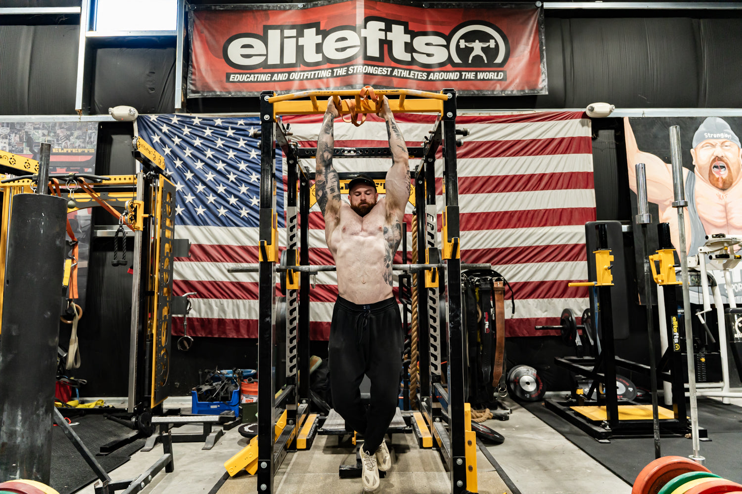 Jon Heck training beneath the elitefts banner during his Table Talk visit