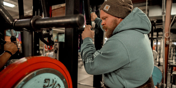 guy running monoliftman benching in competition