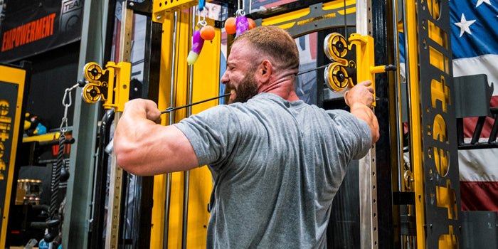real delt work by a guy using a cable machine