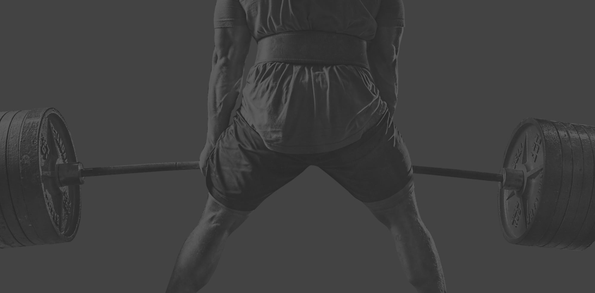 Man using belt while lifting