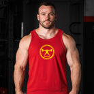 Man wearing a red tank top with a logo in a gym setting-all-goups