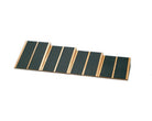 Wooden ramp with green surface on a white background