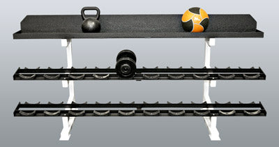 Wall-mounted fitness equipment rack with dumbbells, kettlebell, and medicine ball on a gray background