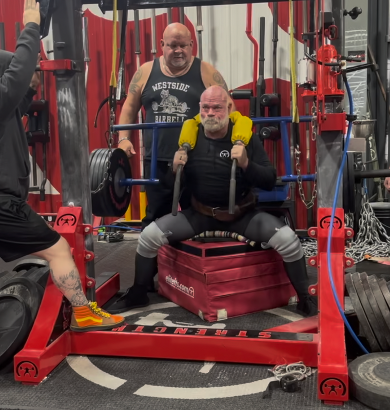 picutre of elitefts WarGrip Training Knee Sleeves being used while squatting