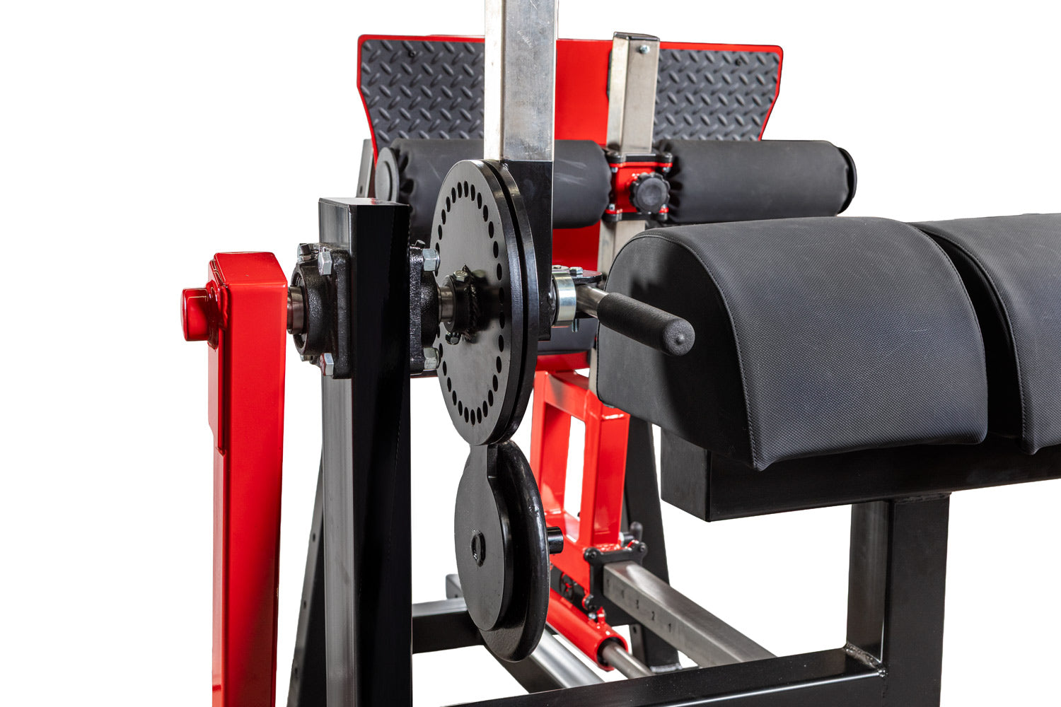 Close-up of a mechanical device with red and black components on a white background