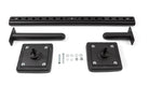 Set of black metal brackets and components on a white background