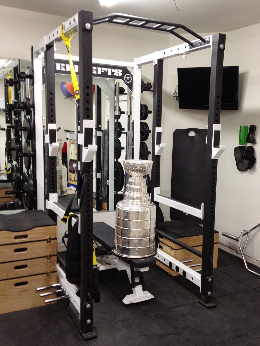 Elitefts 3X3 Basic Collegiate Power Rack located in a workout space