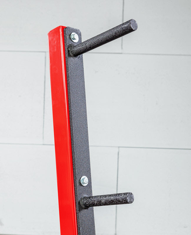 Red and black weightlifting platform with two bars on a tiled wall background