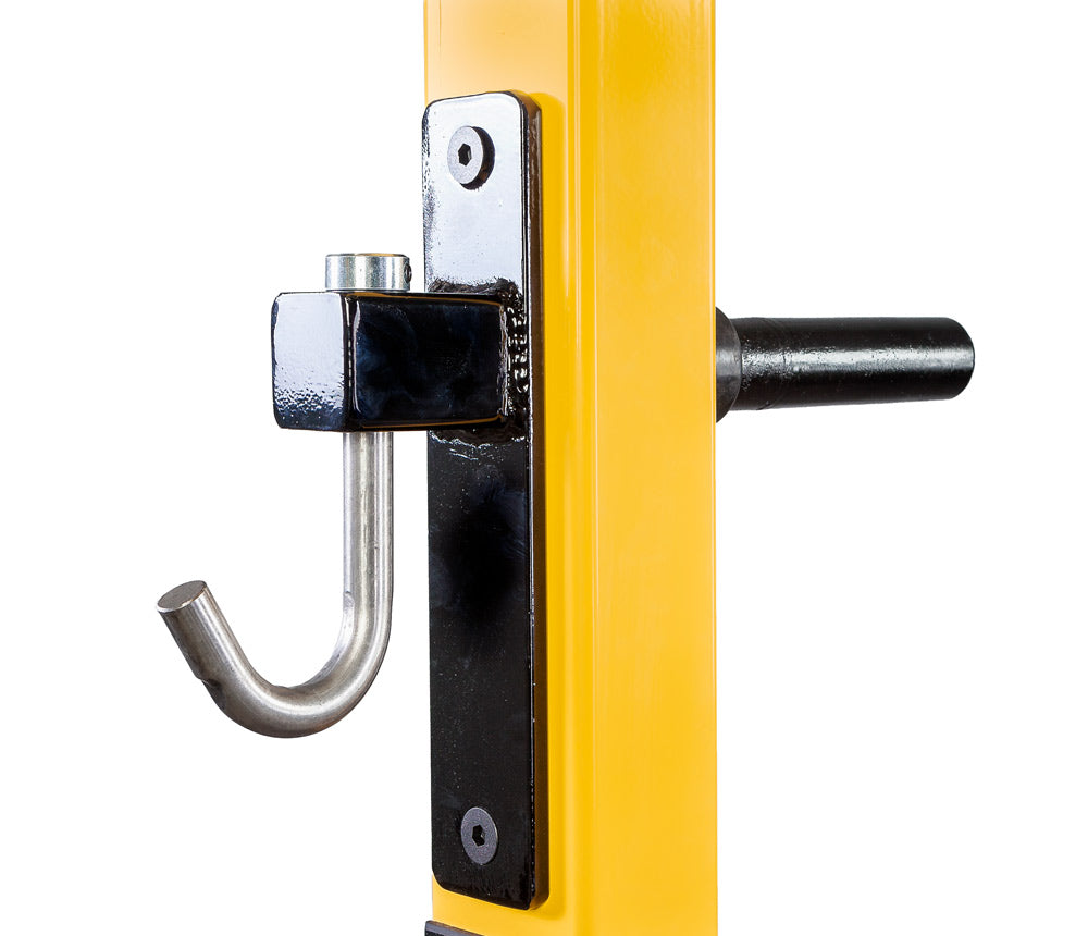 Close-up of a yellow door with a black handle and silver lock mechanism on a white background