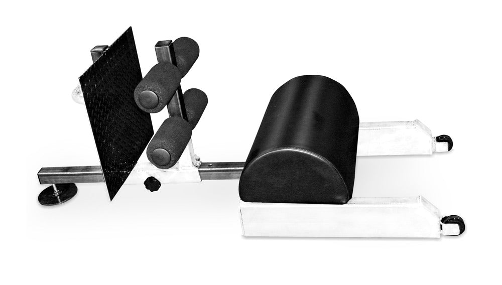 Black and white Scholastic Floor Glute Ham Raise