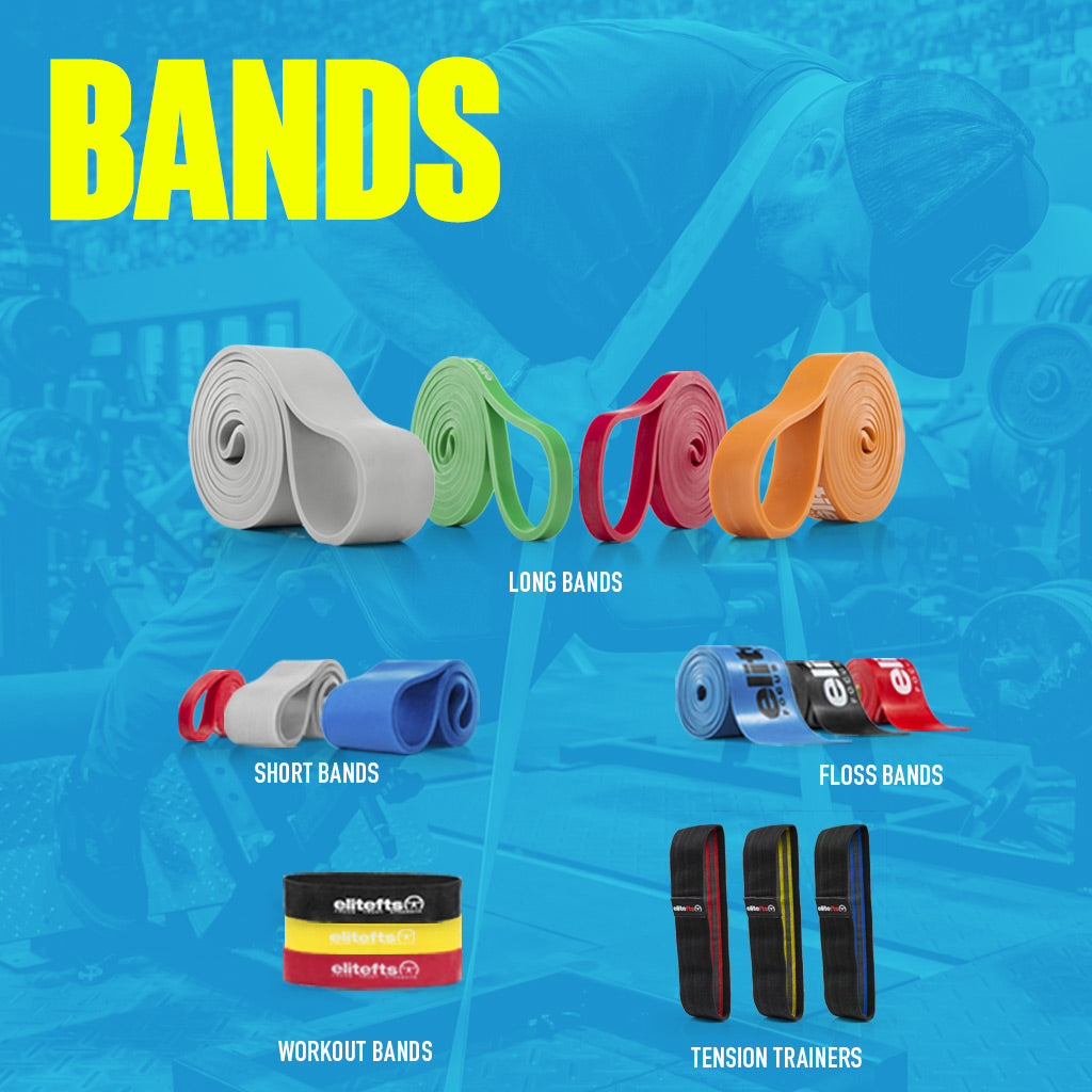 Collection of resistance bands in various colors on a blue background with fitness equipment.