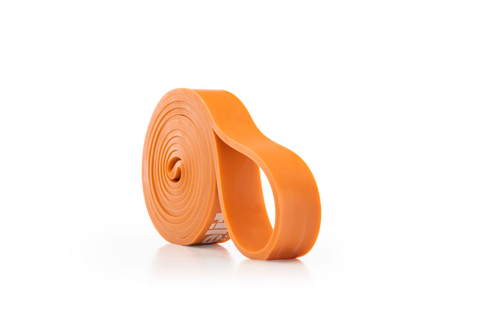 Orange resistance band on a white background