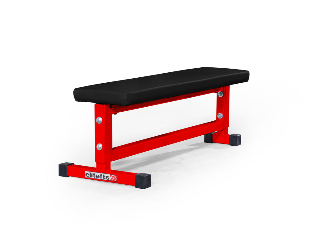 Black weight bench with red frame on a white background