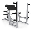 Fitness equipment, specifically a weight bench with arm curl attachment on a white background