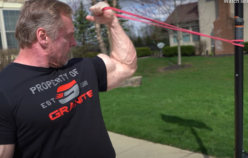 using a mini band for a bicep curl