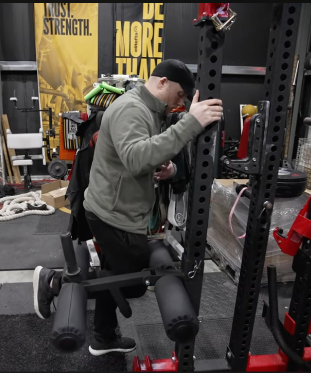 Standing Leg Curl With Attachment being used