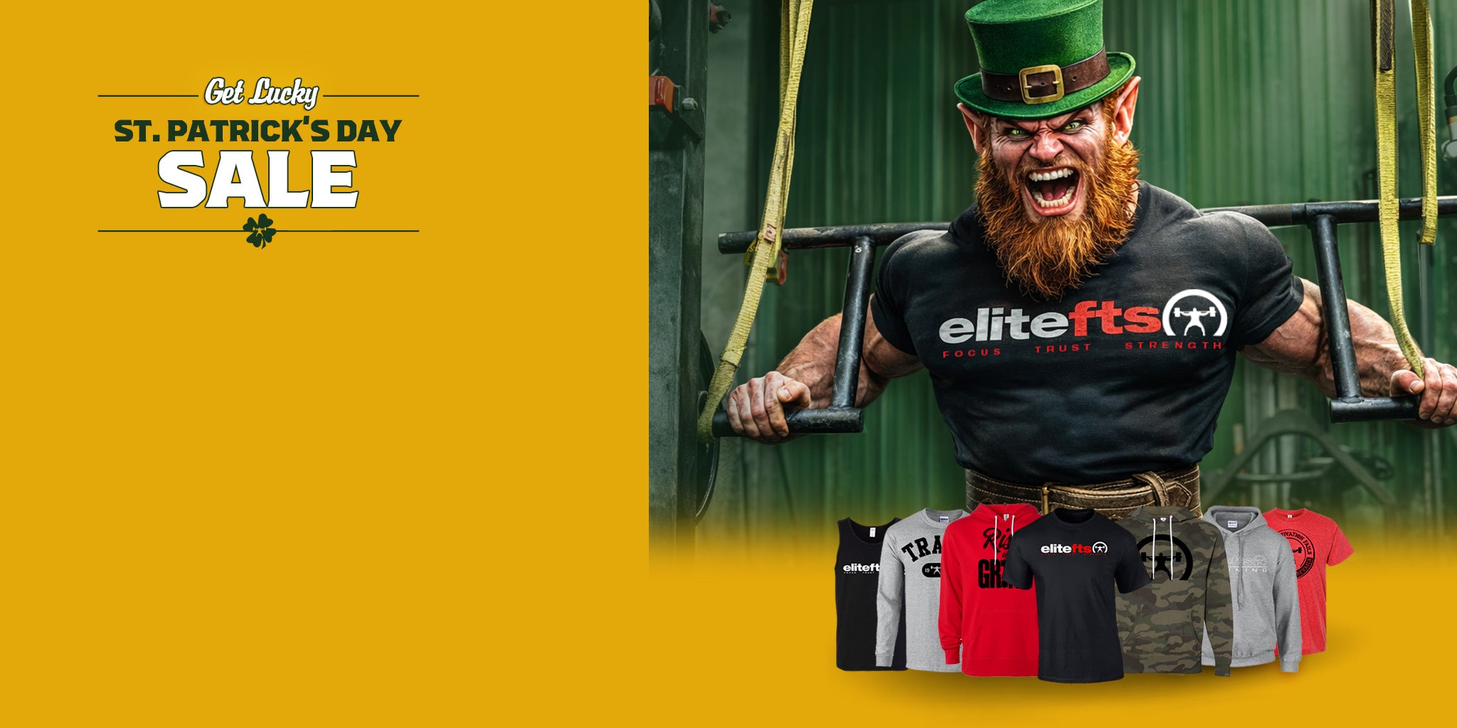 Person wearing an 'elitefts' t-shirt with St. Patrick's Day sale text on a yellow background