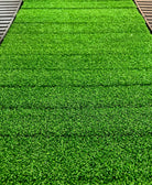 upclose picture of Trueform Runner Curved Treadmill turf