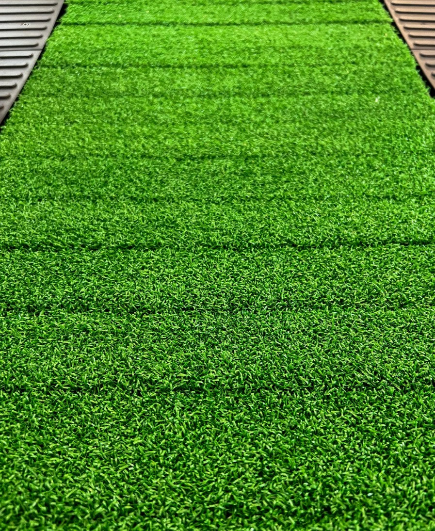 upclose picture of Trueform Runner Curved Treadmill turf