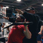 picture of pulldowns using the Level 5 Tsunami Lat Pulldown Bar 54"