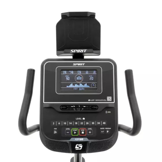 Upright bike with digital display and Spirit branding on a white background