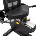 Close-up of a black exercise bike with a seat and handlebars on a white background
